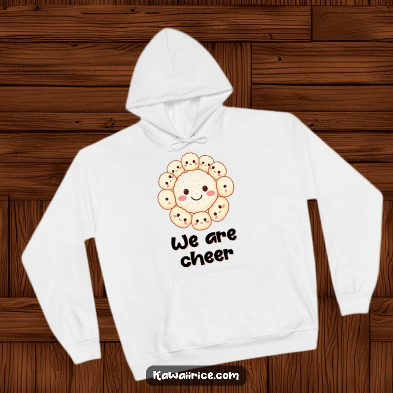 Funny hoodie showcasing a large smiley face formed by cute, small rice balls together. Warm and cheerful.