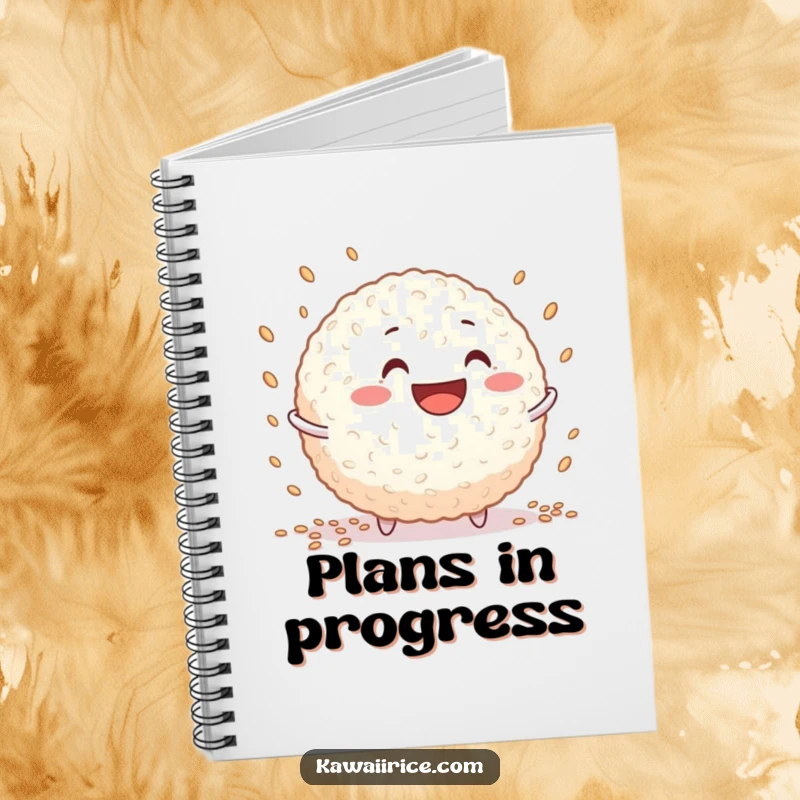 Funny rice ball notebook with a grinning character juggling tiny grains, great for notes and doodles.